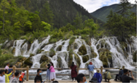 Stranded tourists evacuated from China's famed Jiuzhaigou World Heritage site after mudslides, heavy rain