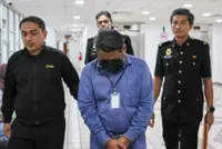 Civil servant charged with accepting RM12,200 in bribes
