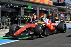 Motor racing-Hamilton questions costly Ferrari pitstop decision