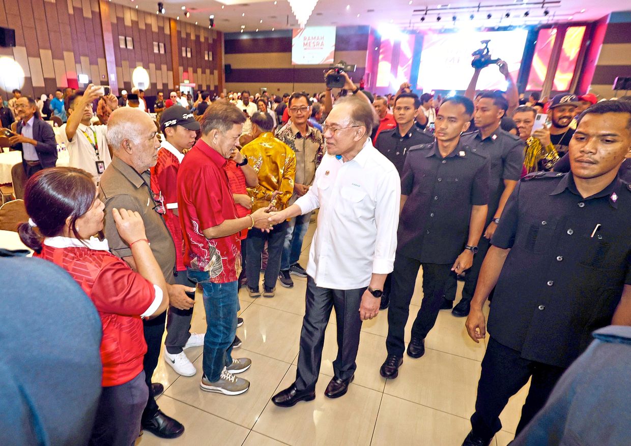 On the ground: Anwar attending an event with Negri Sembilan village development and security committee leaders in Lukut. — FAIHAN GHANI/The Star