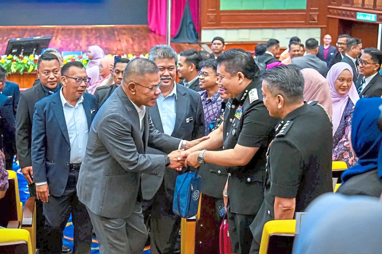 Nice to meet you: Saifuddin meeting with attendees at the Home Ministry’s monthly assembly in Putrajaya. — Picture courtesy of Saifuddin Nasution’s Facebook