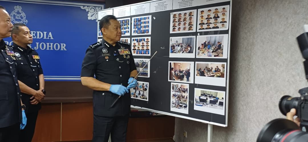 Cops to work with Interpol after busting two Forest City scam centres