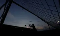Soccer-English soccer to trial goalkeeper injury rule to deter tactical stoppages