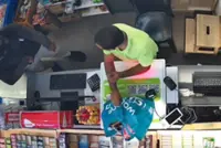 QuickCheck: Was a convenience store worker in KL threatened with a gun during a robbery?