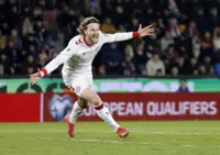 Soccer-Celtic sign Denmark forward Hogh on a four-year deal