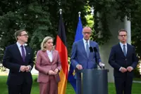 Pressure mounts on Germany's Merz after fractious reshuffle