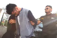 Man charged in Johor Baru court with murdering 18-month-old son