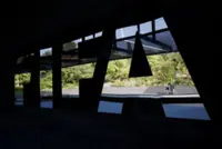 Soccer-Reaction to FIFA's private investment plan