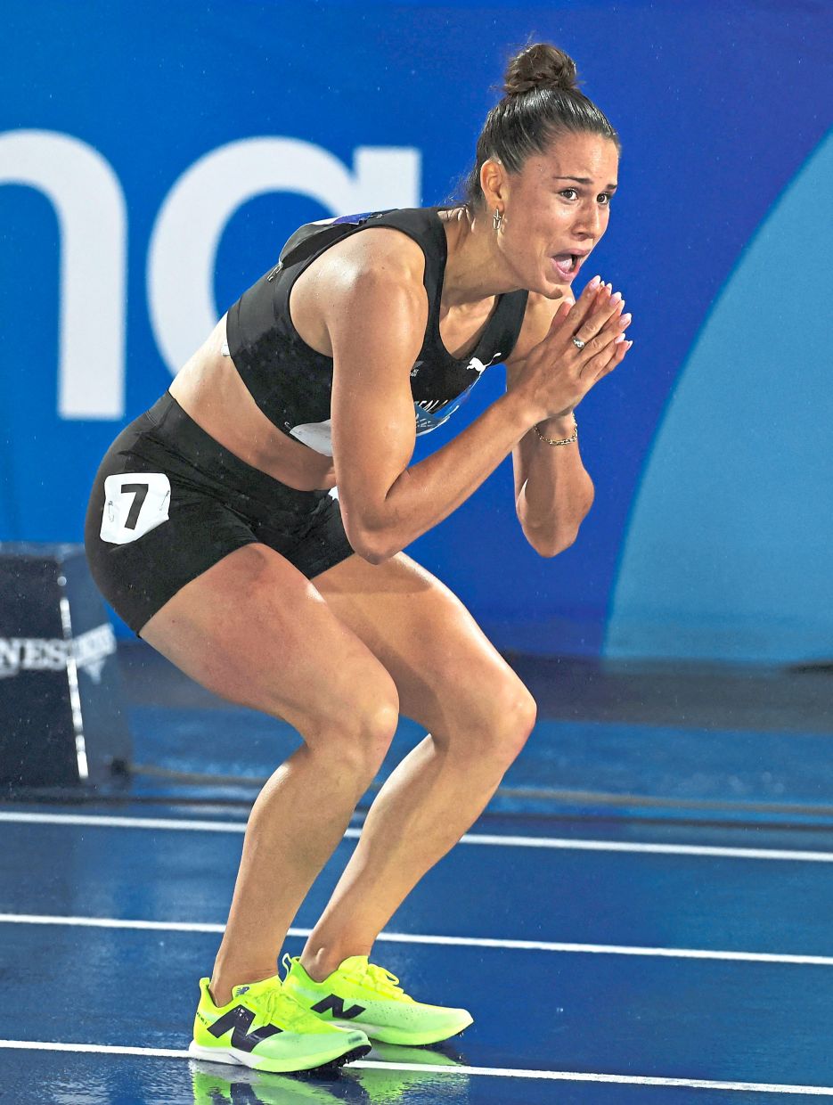 New Zealand’s Zoe Hobbs reacts after her surprise victory in the women’s century sprint. — AP/Reuters