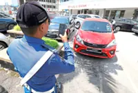 Compensation in spotlight after parking system outage