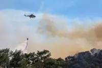 Greek firefighters battle deadly wildfires on Crete for a second day