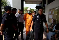 Driver charged with murder over Teluk Intan crash that killed two teen girls