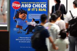 Singapore police probe 255 over scam cases involving losses of about $5.6 million