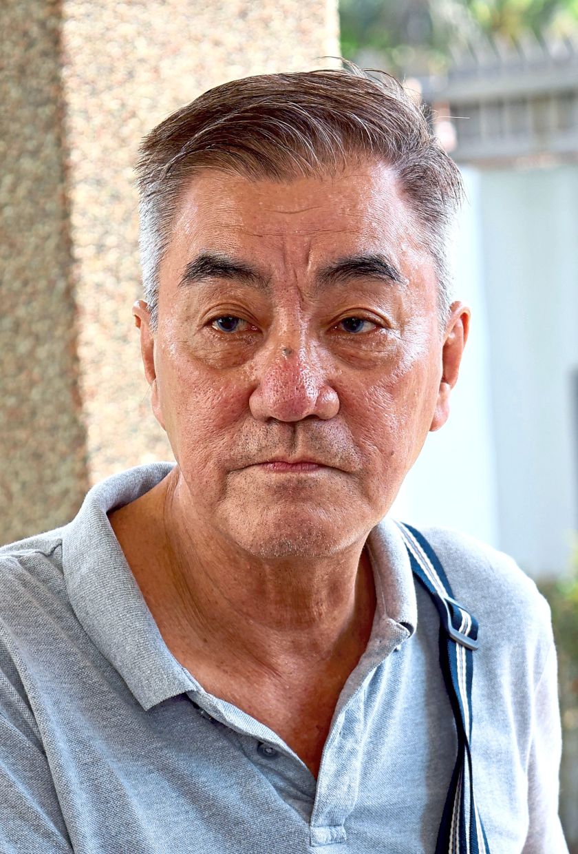 Khoo says both his neighbours have had cobras enter their houses.