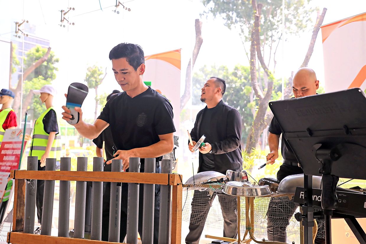 The Reuz Band making music with recycled materials.