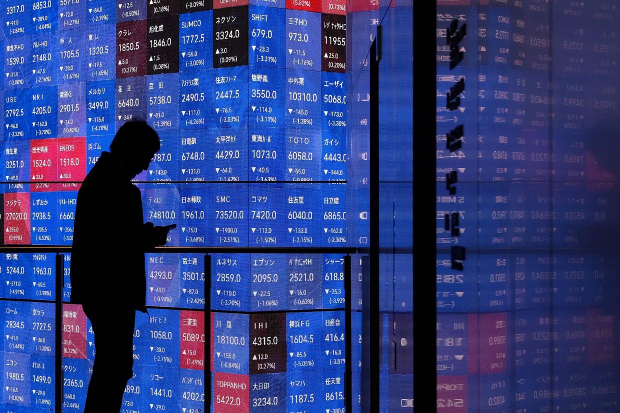 Japan's Nikkei jumps 4% after Wall Street rally, BOJ decision awaited
