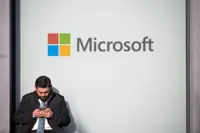 Microsoft sets record with near $450 billion single-day gain in market value