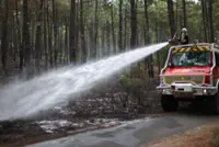Greece fights fires near Athens as France, Spain improve