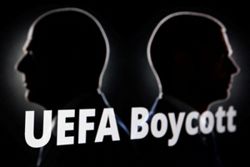 Soccer-Reaction to UEFA vote to boycott World Cup over FIFA stake sale plans