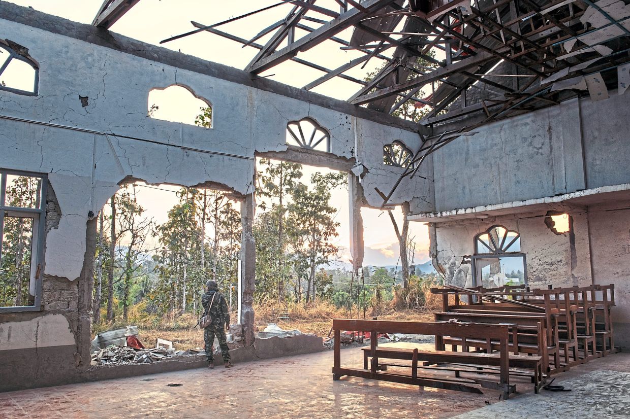 A church left in ruins by Myanmar’s military in Karenni. — Adam Ferguson/The New York Times