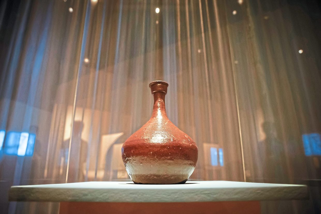 One of three jugs for ‘makgeolli’ that was given in 1851 to French diplomat Charles de Montigny by Bigeum’s islanders when he came to rescue the shipwrecked crew of the French whaler ‘Narwhal’, at the National Palace Museum in Seoul. — Cho Woo-hae/The New York Times
