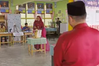 Negri polls: Bride turns heads as she votes in wedding attire