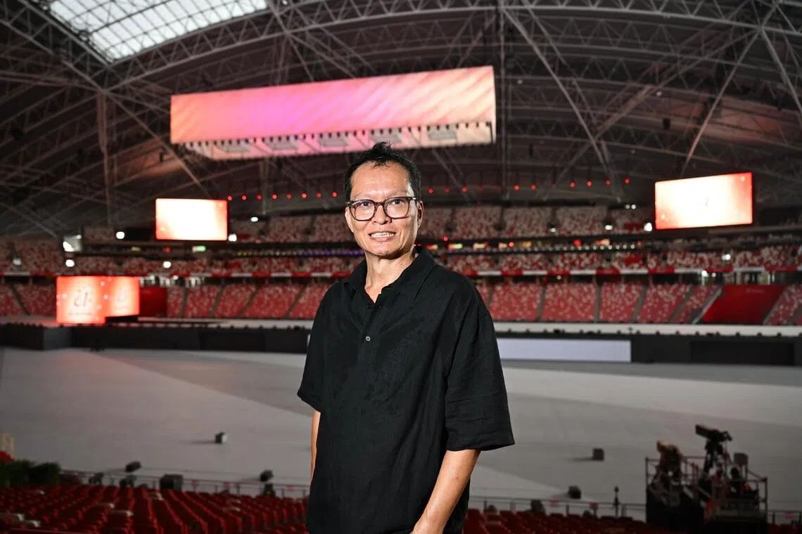 Set designer Randy Chan, 56, jumped into preparations for the set shortly after the previous NDP wrapped up. - Photo: ST