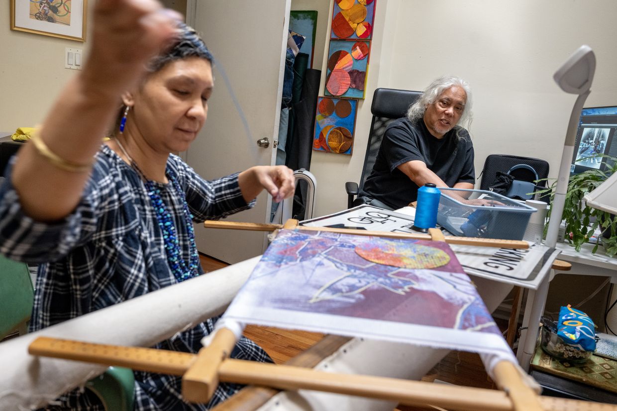 Johnson (left) and Carrillo work together in her home office during a recent long weekend visit.