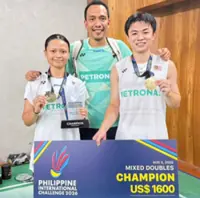 Dania's long road back ends in gold with Boon Zhe in Manila