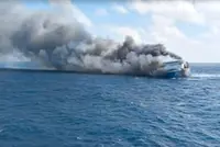 At least five dead, 41 missing after ferry catches fire at sea