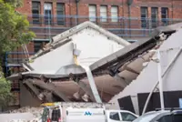 Two people hospitalised after building collapse in Sydney