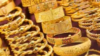 Gold firms as oil prices slump after Trump holds off on Iran attack