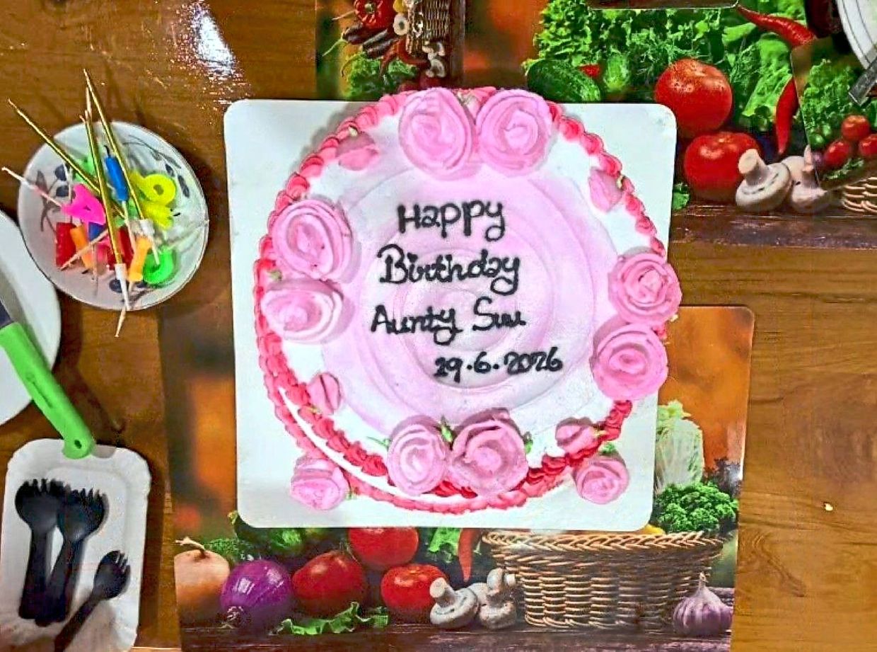 The birthday cake for Suu Kyi is seen during her meeting with Baecque in Naypyidaw. — AP