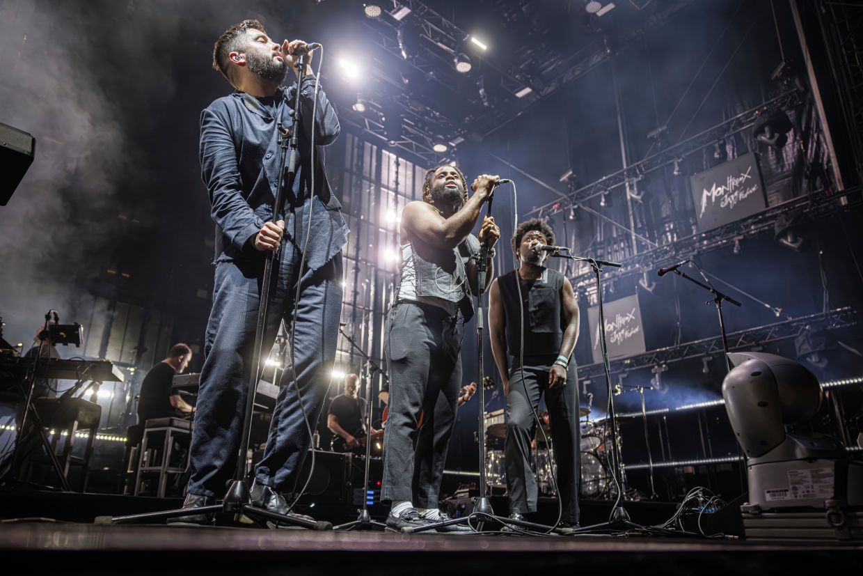 Massive Attack says Singapore police detained, questioned them after concert