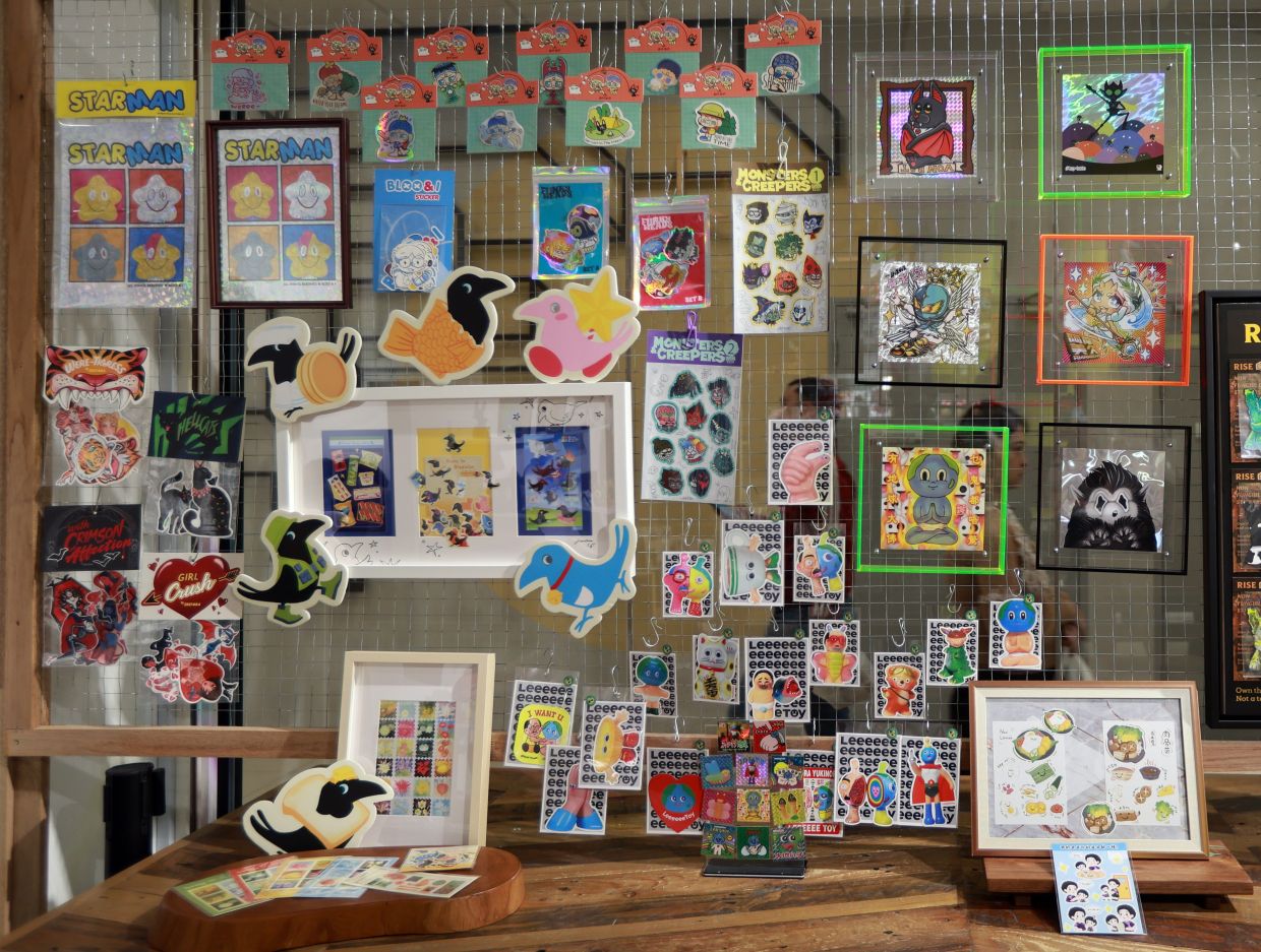 Sticker art offers a viable medium for contemporary gallery practice, bridging urban visual culture and art spaces. Photo: The Star/Chan Tak Kong