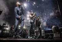 Massive Attack says Singapore police detained, questioned band members after concert