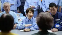 PM Takaichi visits quake-hit southern Japan as cleanup begins in intense heat