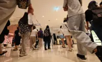 Malls for the young, airports for the old: Koreans beat the heat indoors