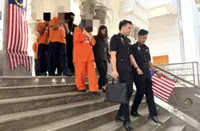 Five Immigration officers remanded over alleged MyIMMs hacking to approve work passes