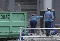 Two evacuated employees who died in Japan's Aeon mall explosion were told to return inside by employer