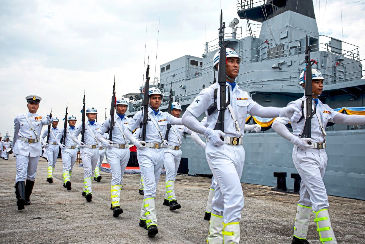 A silent drill performance during the handover ceremony.