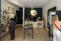 These employees like their AI boss. Its shop is kind of a disaster