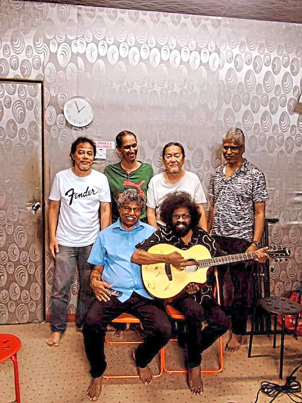 The guitar signed by members of Alleycats went to the highest bidder at Pikom AI Masterclass Music Festival 2026. — Handout