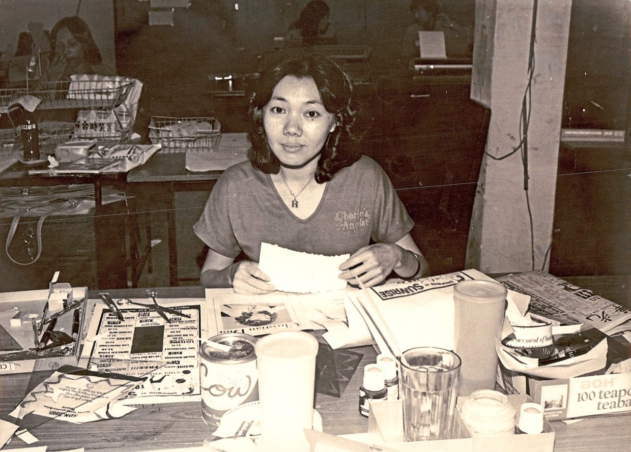 A paste-up artist assembles a newspaper page layout using text cut-outs and cow gum adhesive. Before computers, journalists relied on typewriters to write and edit their stories.