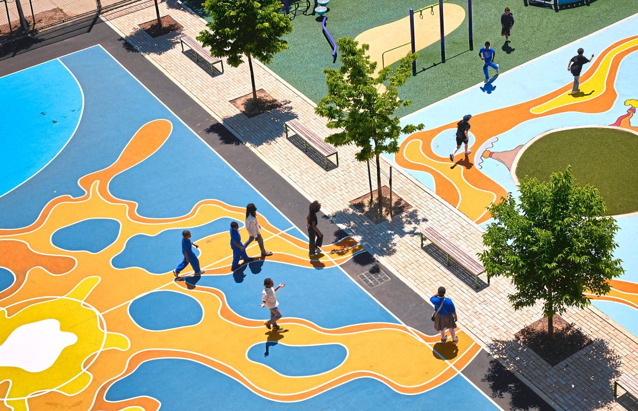 A shared playground featuring a 'floor is lava' obstacle course at The Brooklyn Brownstone School and the Stephen Decatur Magnet School of Leadership, Exploration and the Arts in New York.