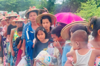 Conflict-displaced people in Myanmar forced to relocate again as flooding hits Laymyethna