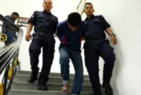 Lorry driver charged with sexually assaulting two teenage daughters