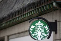 South Korea police raid Starbucks HQ over 'Tank Day' fiasco
