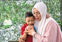 This Malaysian mother of eight travels 100km for her son's  therapy sessions