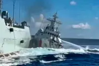 Two Chinese coast guard personnel marked as 